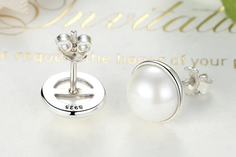 Elegant Beauty, Round White Shell Pearl Stud Earrings - Bakyat Store