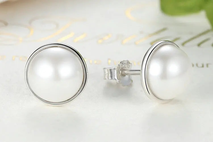 Elegant Beauty, Round White Shell Pearl Stud Earrings - Bakyat Store